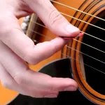 Strings and Chords: Begin with Free Beginner Guitar Lessons!